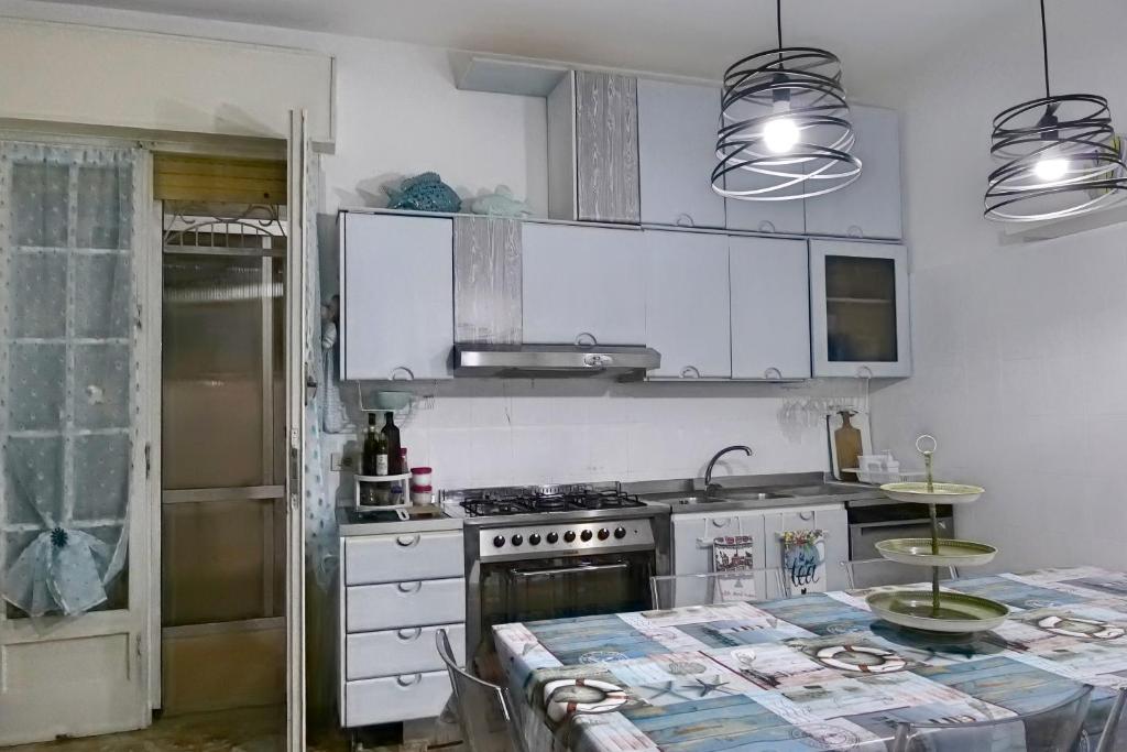 A kitchen or kitchenette at Villa Gisella