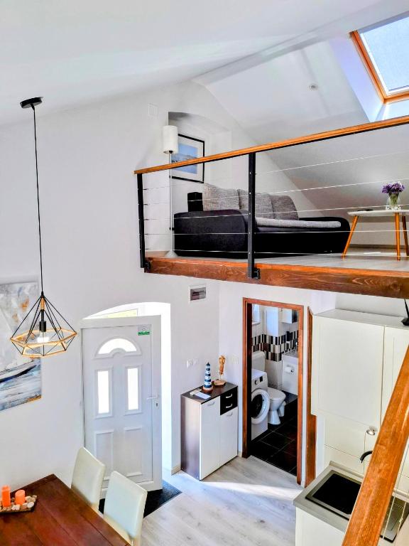 Posteľ alebo postele v izbe v ubytovaní Holiday Home Don