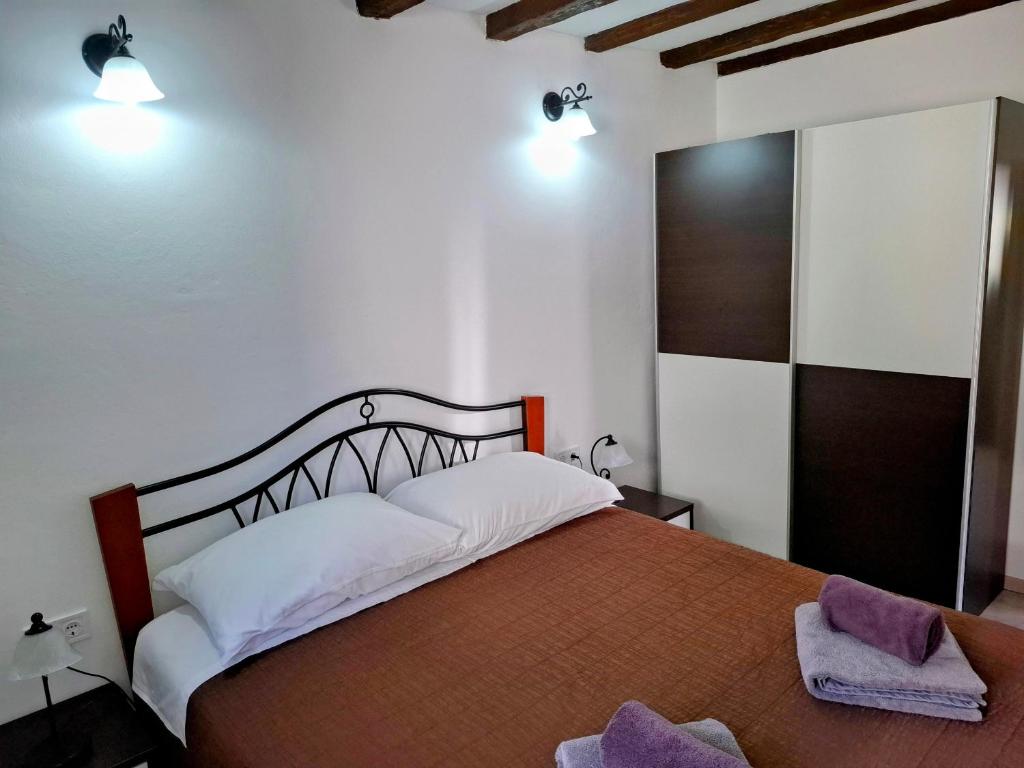 Posteľ alebo postele v izbe v ubytovaní Holiday Home Don