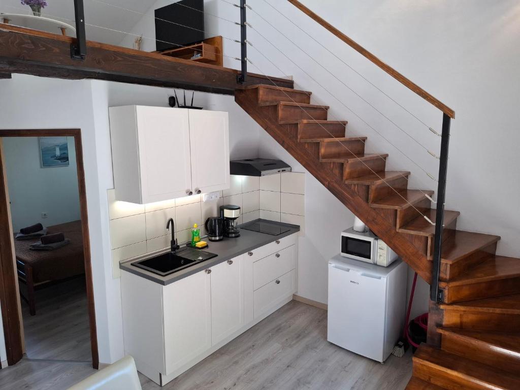 Kuchyňa alebo kuchynka v ubytovaní Holiday Home Don