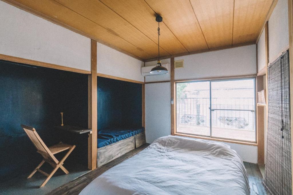 Postel nebo postele na pokoji v ubytování guesthouse TANDEM