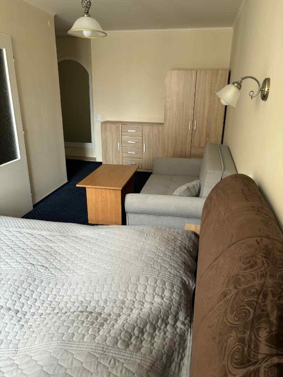 Postel nebo postele na pokoji v ubytování Hotel Alster