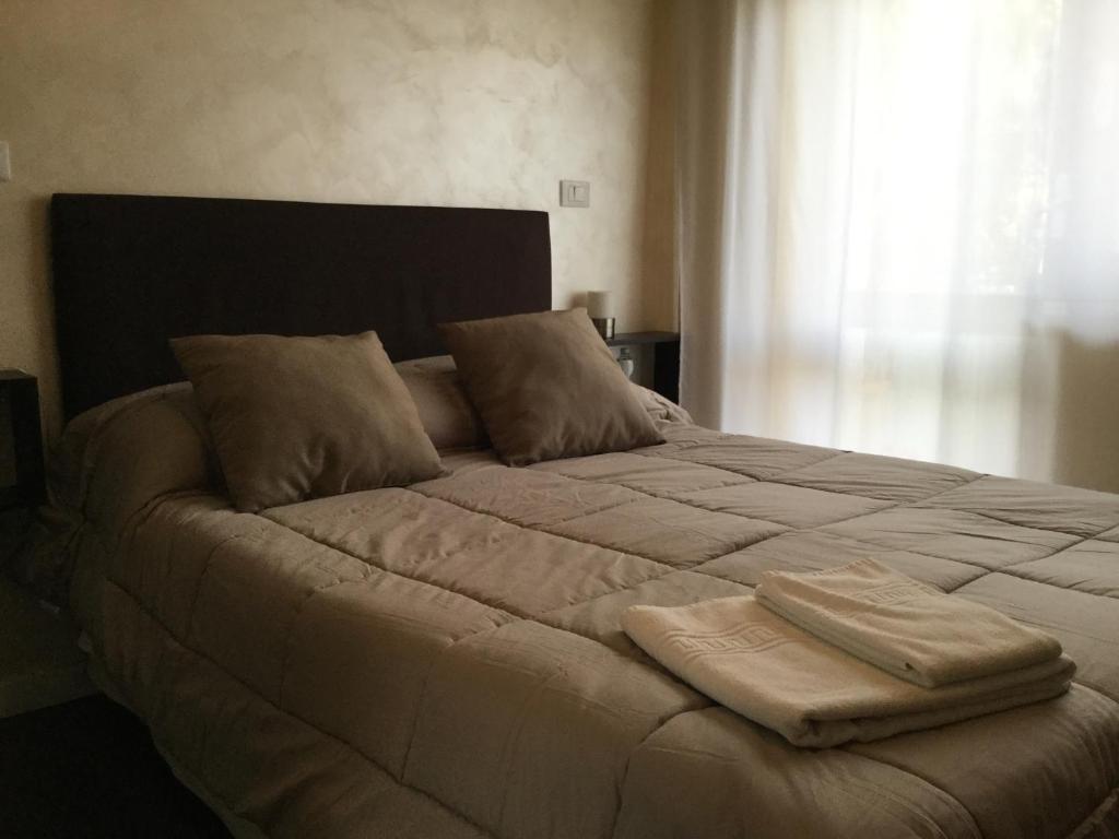 Postel nebo postele na pokoji v ubytování Domus Corso Umberto 18 B&B
