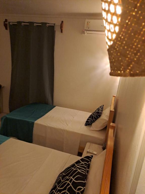 Postel nebo postele na pokoji v ubytování La Residence Emmaüs