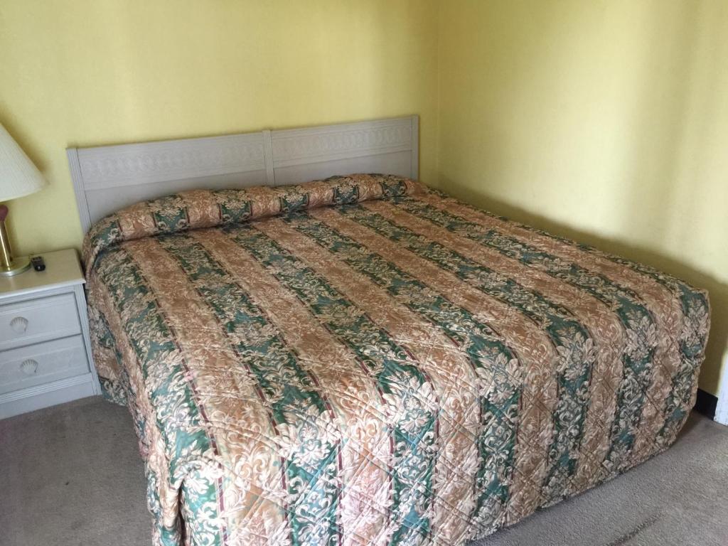 Ein Bett oder Betten in einem Zimmer der Unterkunft David&#39;s Landing