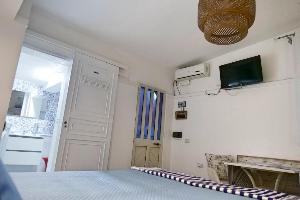 A television and/or entertainment centre at Depandance in Villa Gisella