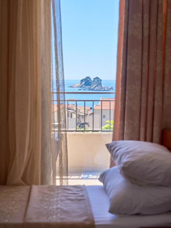 Postel nebo postele na pokoji v ubytování Hotel Petrovac