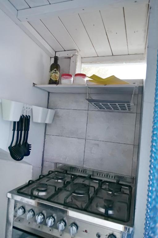 A kitchen or kitchenette at Depandance in Villa Gisella