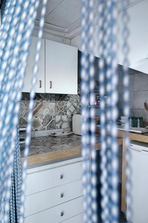 A kitchen or kitchenette at Depandance in Villa Gisella