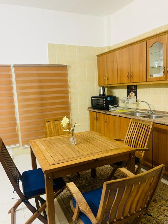 Kuchyň nebo kuchyňský kout v ubytování Comfort and Central Stay