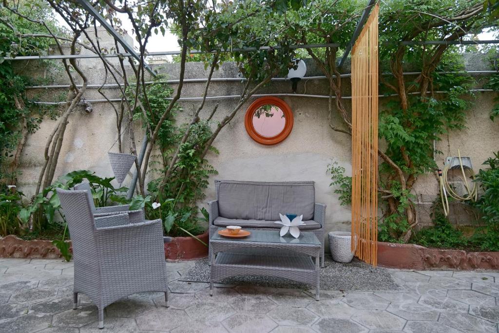 A seating area at Depandance in Villa Gisella