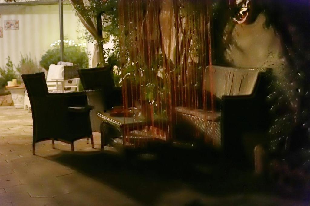 A seating area at Depandance in Villa Gisella