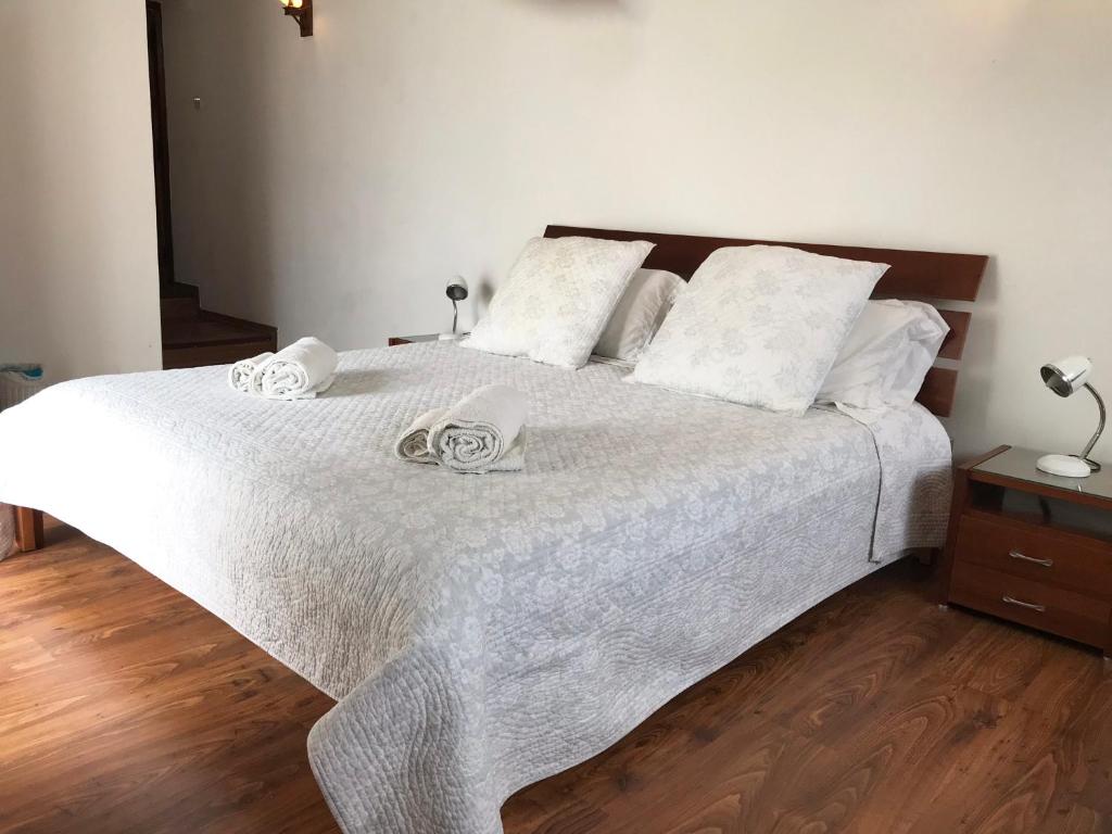 Postel nebo postele na pokoji v ubytování Cobblers