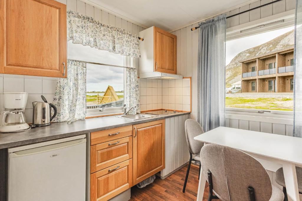 Kuchyň nebo kuchyňský kout v ubytování Ramberg Resort