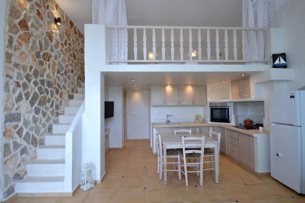 Kuchyňa alebo kuchynka v ubytovaní Kathara Bay Apartments