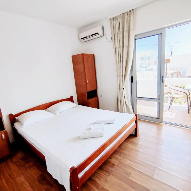 Postel nebo postele na pokoji v ubytování Apartments Hija