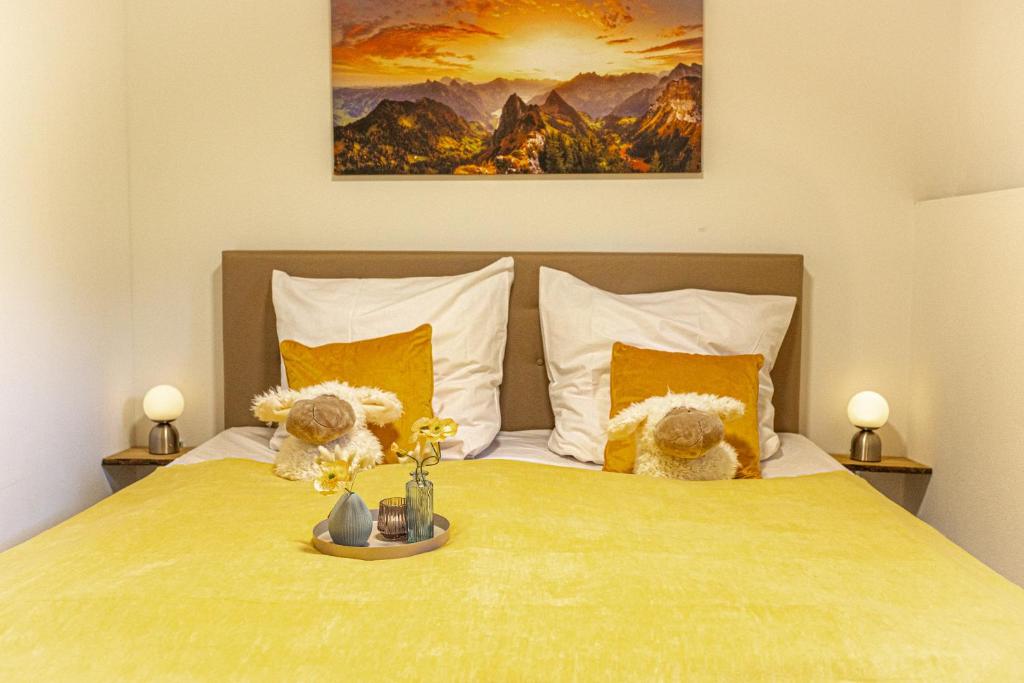 Postel nebo postele na pokoji v ubytování wolke 7, ruhiges Apartment, Kingsizebett, Etagenbett, Terrasse, Garten