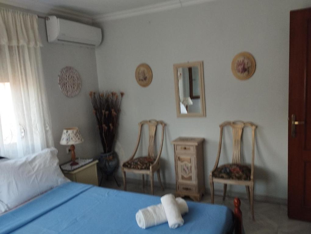 Ένα ή περισσότερα κρεβάτια σε δωμάτιο στο Villa elli 2