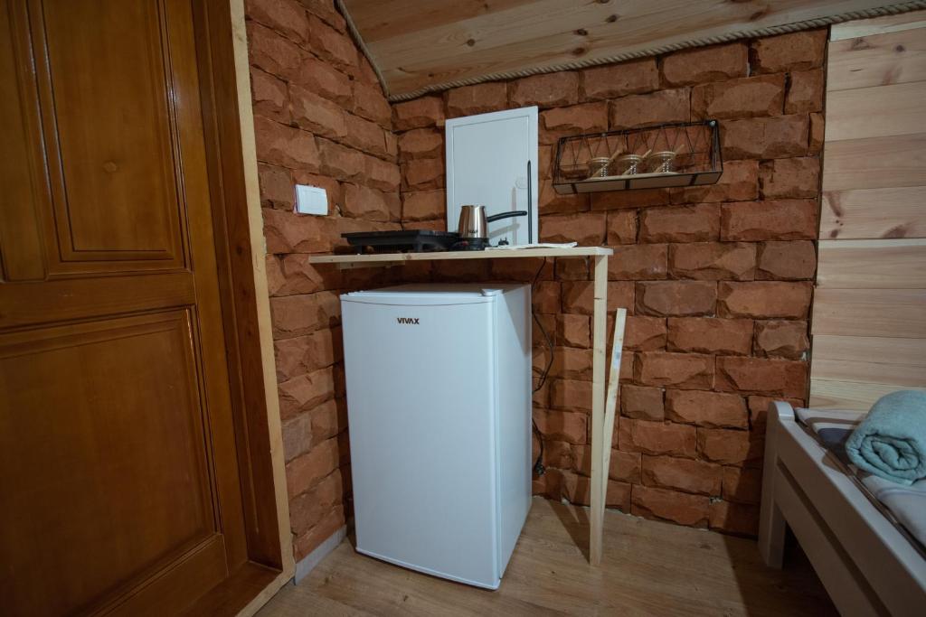 Kuchyň nebo kuchyňský kout v ubytování Camp Laksi
