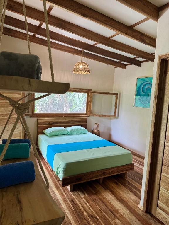 Postel nebo postele na pokoji v ubytování Passion Fruit Lodge