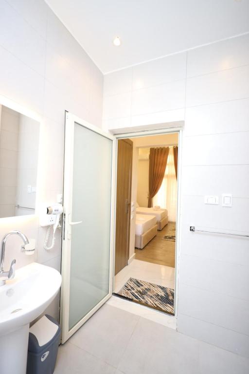 Koupelna v ubytování Aphrodite Boutique Hotel