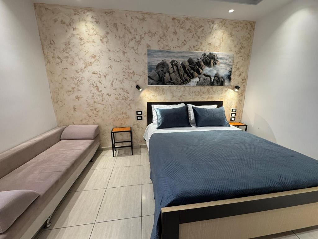 Postel nebo postele na pokoji v ubytování Hotel Ergi