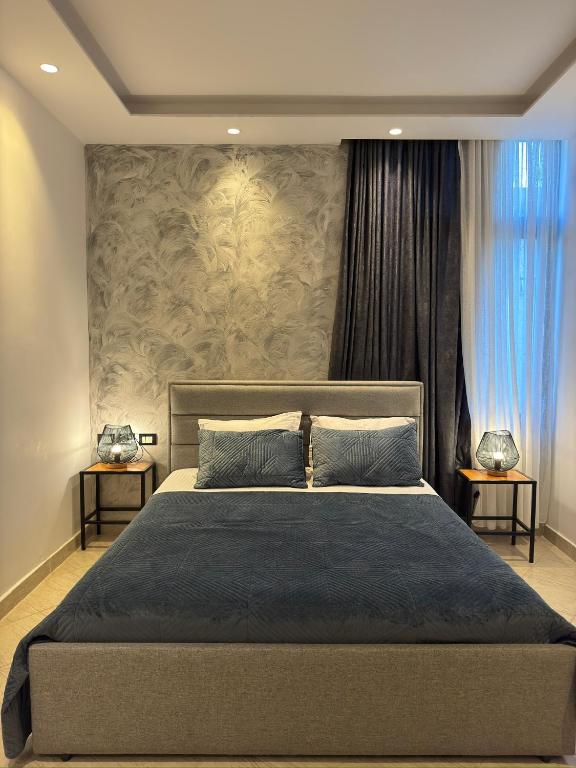Postel nebo postele na pokoji v ubytování Hotel Ergi