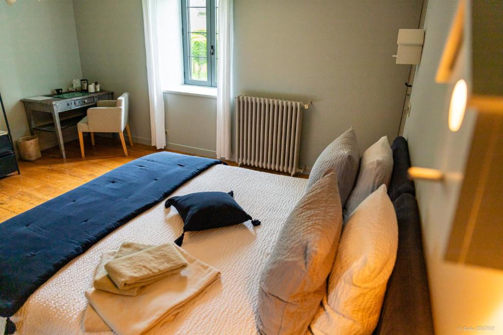 Postel nebo postele na pokoji v ubytování Bed In Bellongue