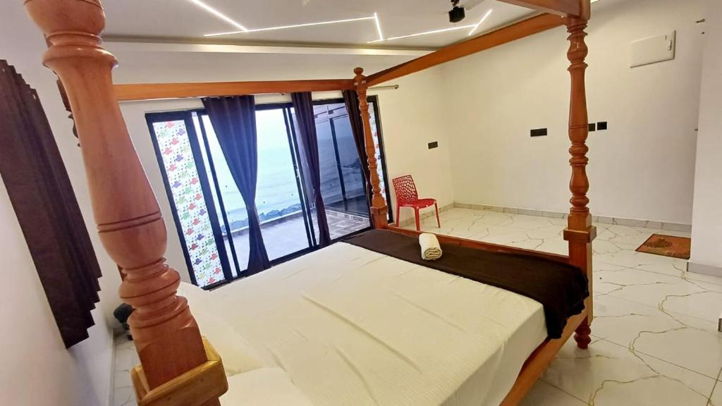 Voodi või voodid majutusasutuse Divine Beach Resorts toas