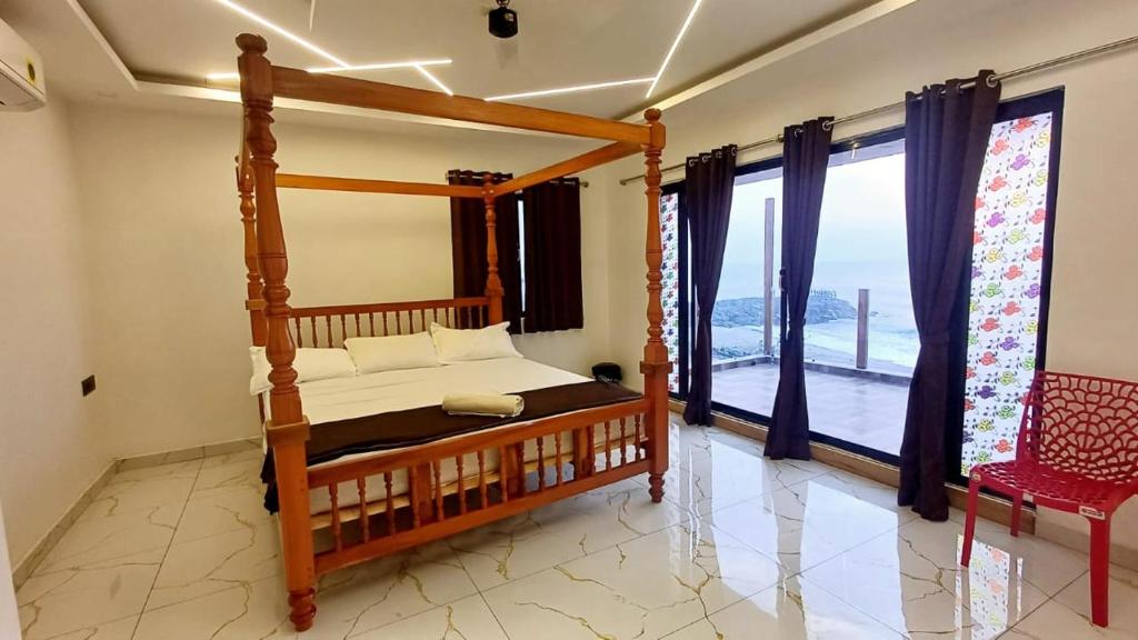 Voodi või voodid majutusasutuse Divine Beach Resorts toas