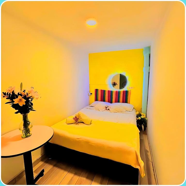 Postel nebo postele na pokoji v ubytování Prisma Hostel