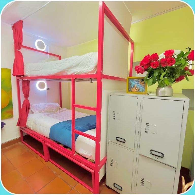 Postel nebo postele na pokoji v ubytování Prisma Hostel