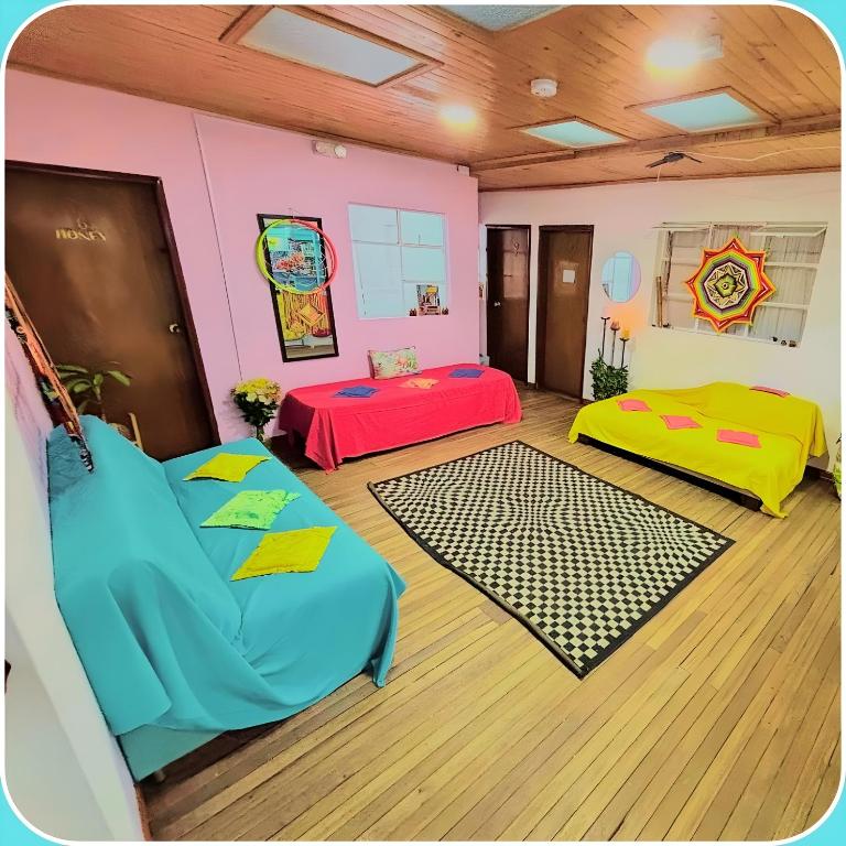 Postel nebo postele na pokoji v ubytování Prisma Hostel