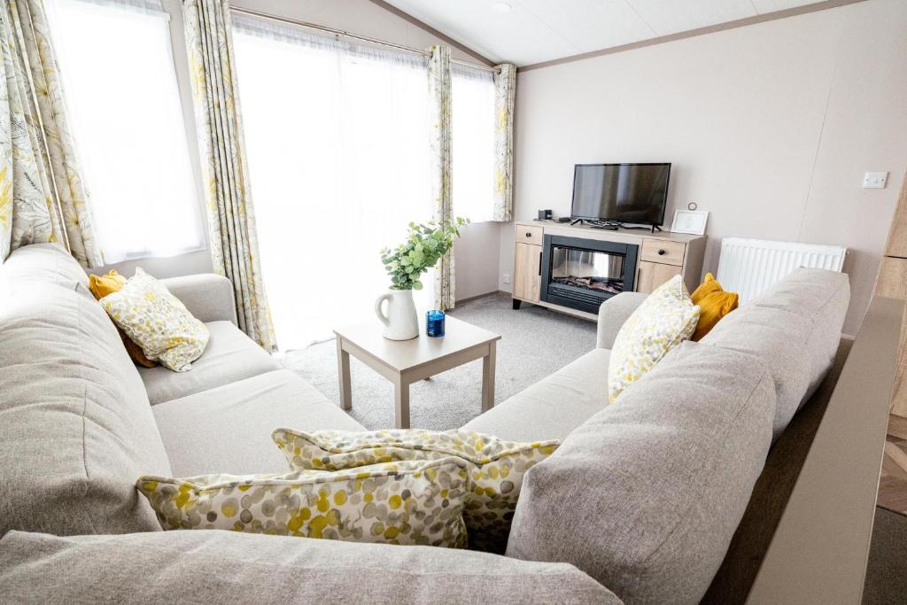 Χώρος καθιστικού στο Family Caravan in Selsey