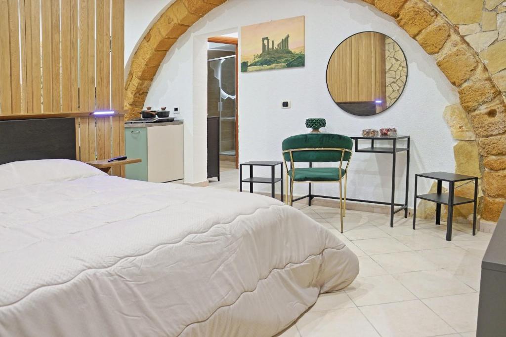 Postel nebo postele na pokoji v ubytování Pindaro