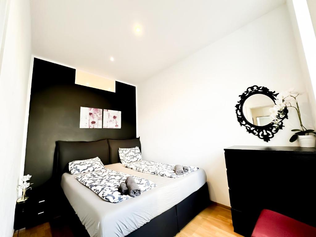 Postel nebo postele na pokoji v ubytování Cozy Rooms in Brigittenau Area MM29
