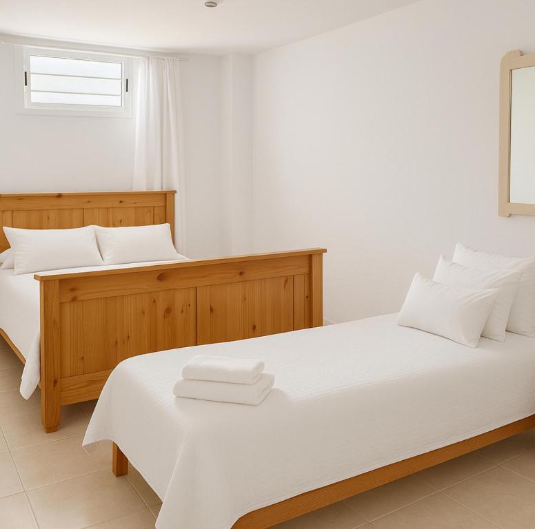 Postel nebo postele na pokoji v ubytování Villa 9 La Alzambra-Puerto Banus
