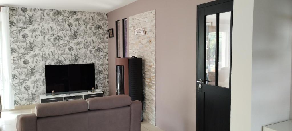 Telewizja i/lub zestaw kina domowego w obiekcie Chez nous à Saint Avertin