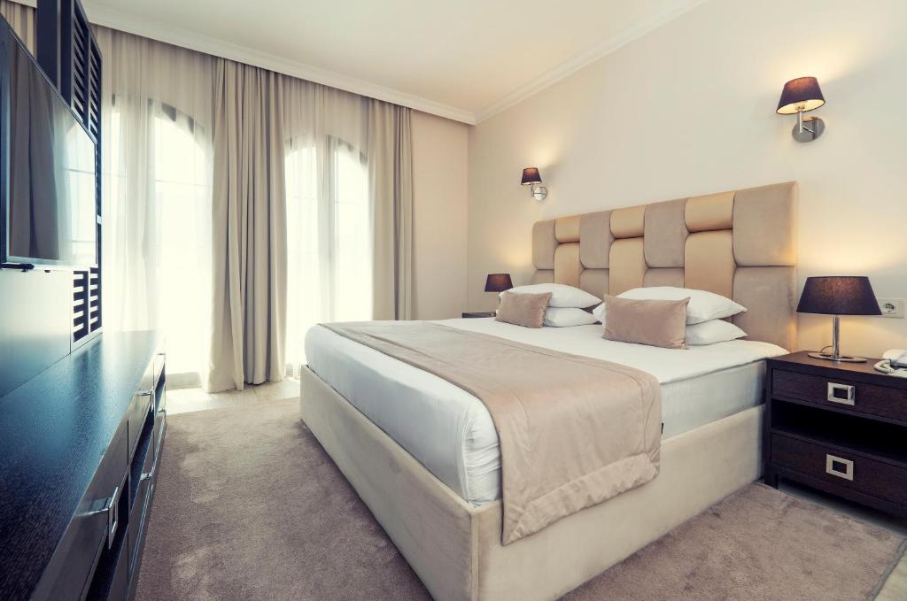 Postel nebo postele na pokoji v ubytování Hotel Moskva