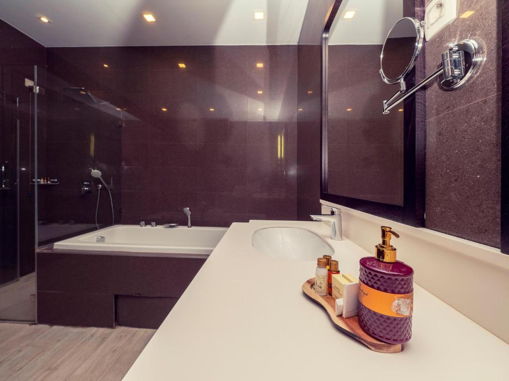 Koupelna v ubytování Hotel Moskva