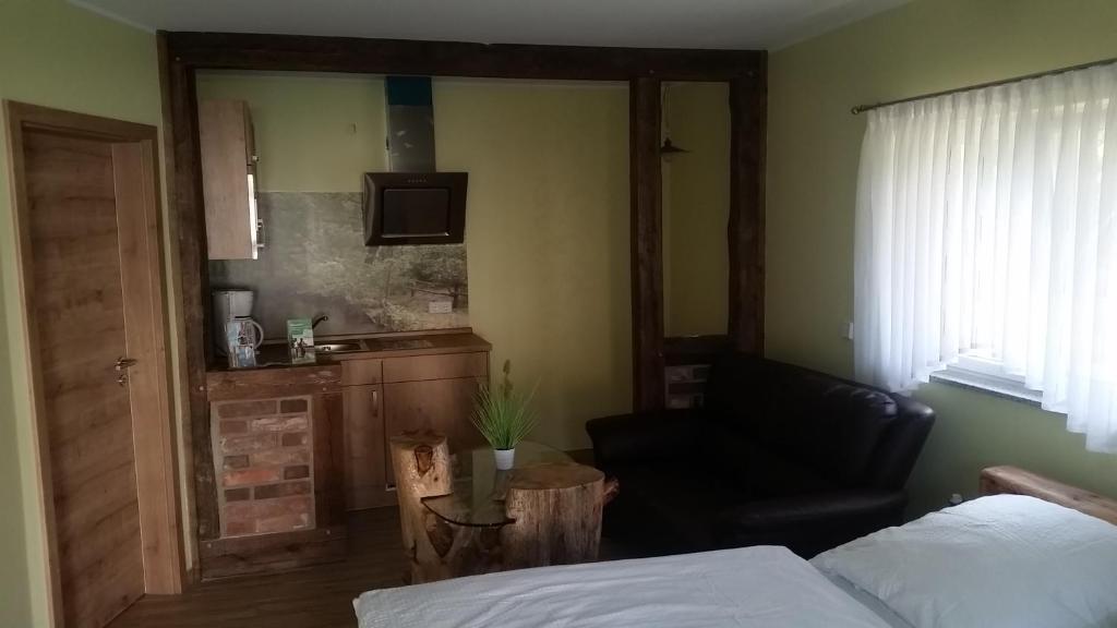 Postel nebo postele na pokoji v ubytování Ferienwohnung am Mühlstein