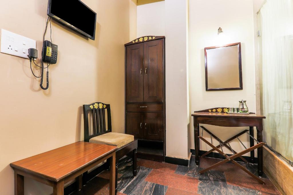 TV a/nebo společenská místnost v ubytování Hotel O Kams Coco De Parra