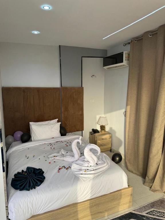 Postel nebo postele na pokoji v ubytování AL krma pyramids hotel