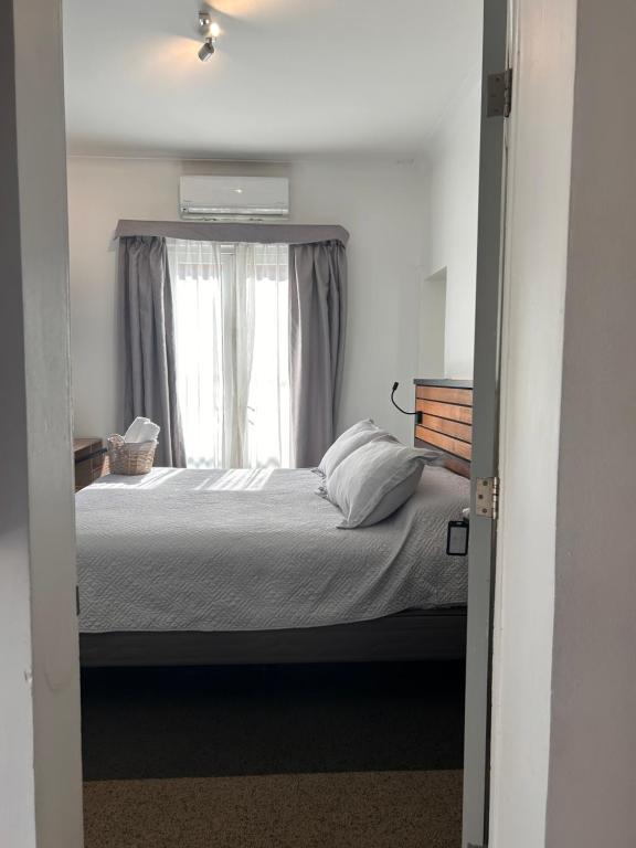 Postel nebo postele na pokoji v ubytování Casona Italia B & B
