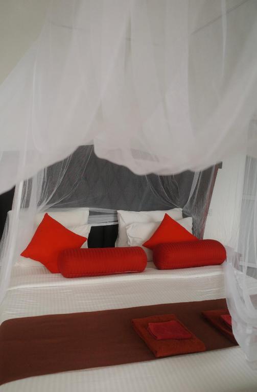 Postel nebo postele na pokoji v ubytování Will Guest Homestay