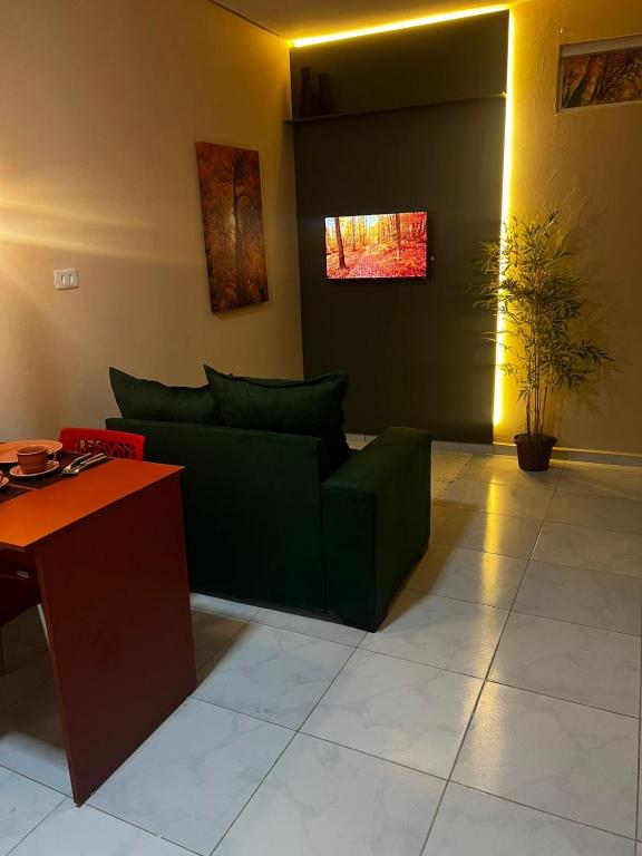 Et tv og/eller underholdning på Flat Outono Aconchegante 2