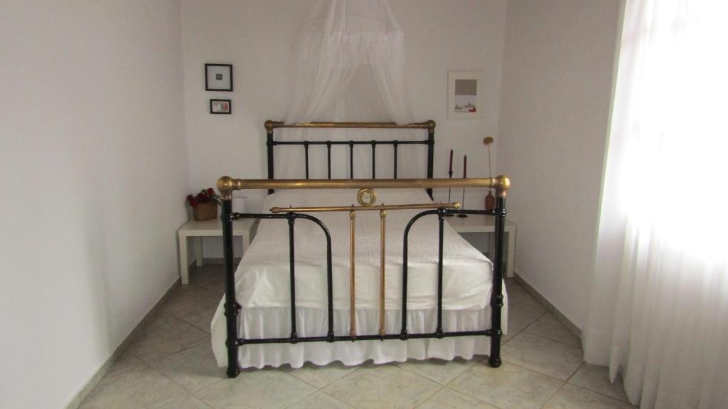 Posteľ alebo postele v izbe v ubytovaní Trouli House