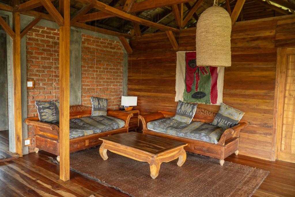 Posezení v ubytování Room Kalimatan in Bukit Cottage