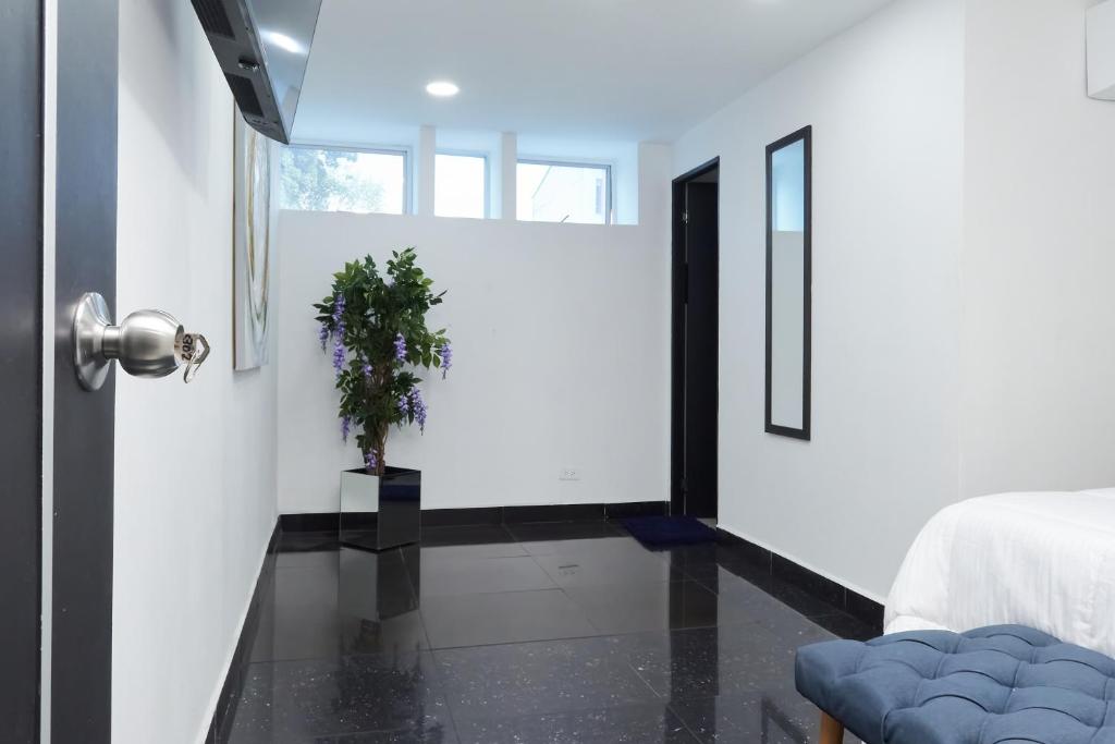Postel nebo postele na pokoji v ubytování 33 HOTEL BOUTIQUE