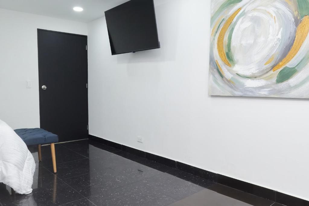 TV a/nebo společenská místnost v ubytování 33 HOTEL BOUTIQUE
